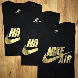 Nike Black shirt, gold logo. Male or female